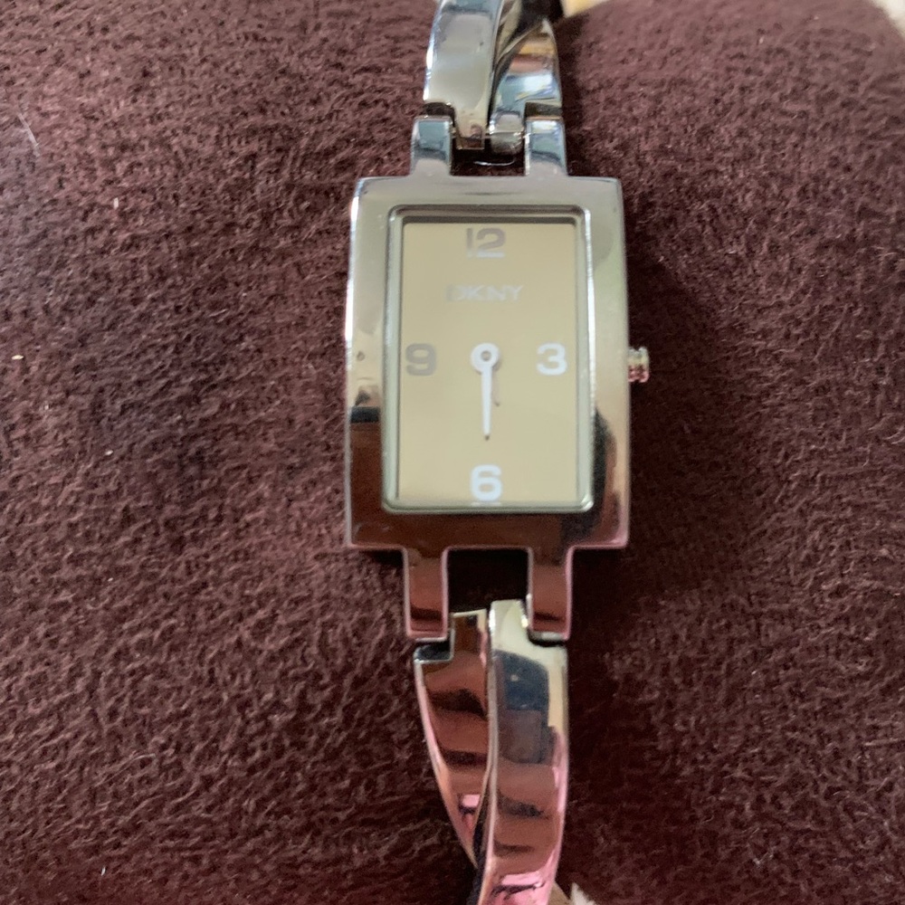 DKNY chrome silver bracelet wrist watch. Rectangle face.